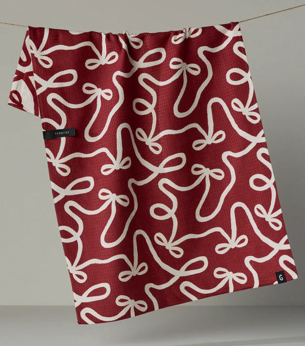 Geometry Luxe Tea Towel | Holiday Bows Pomegranate
